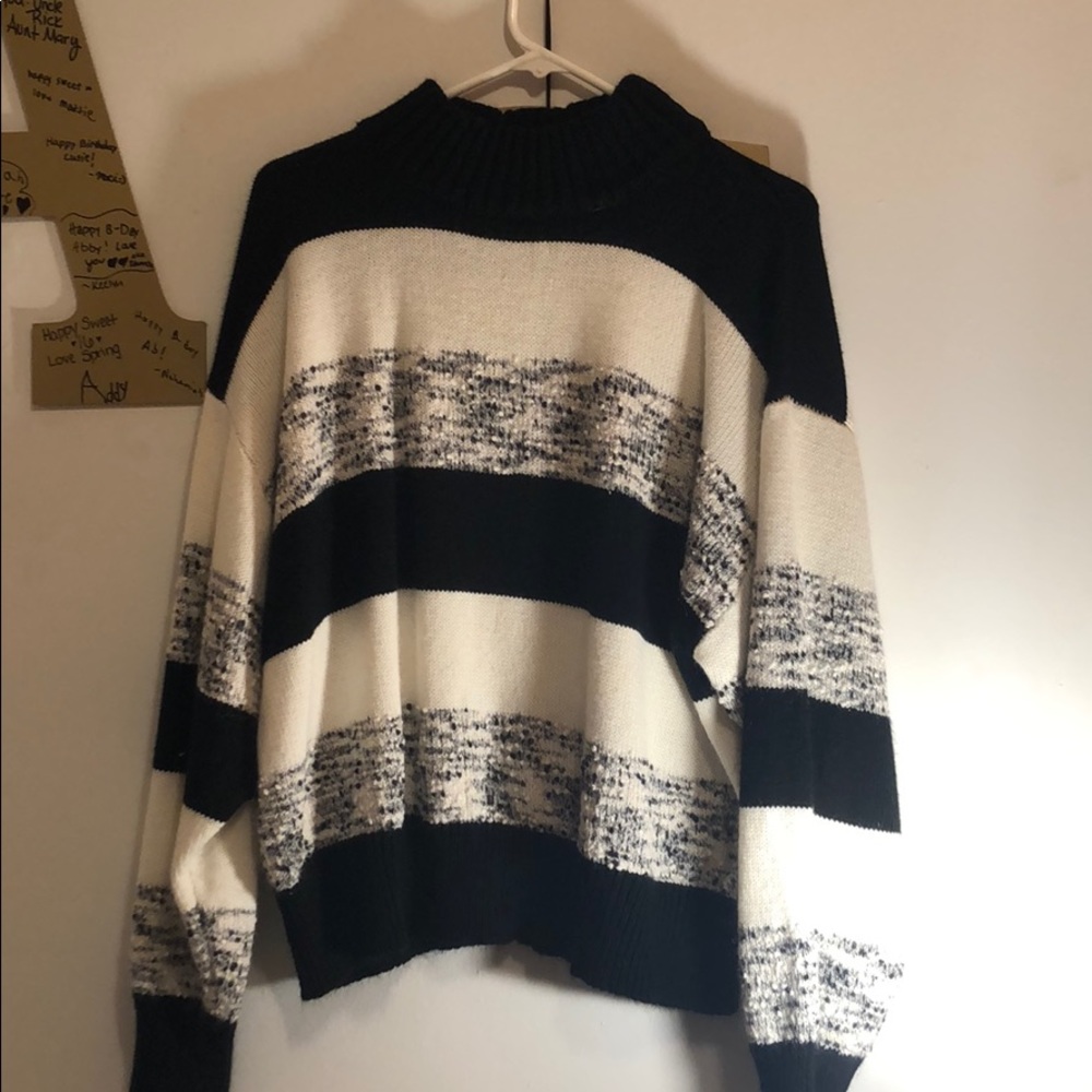 Black and white turtleneck sweater.never worn.